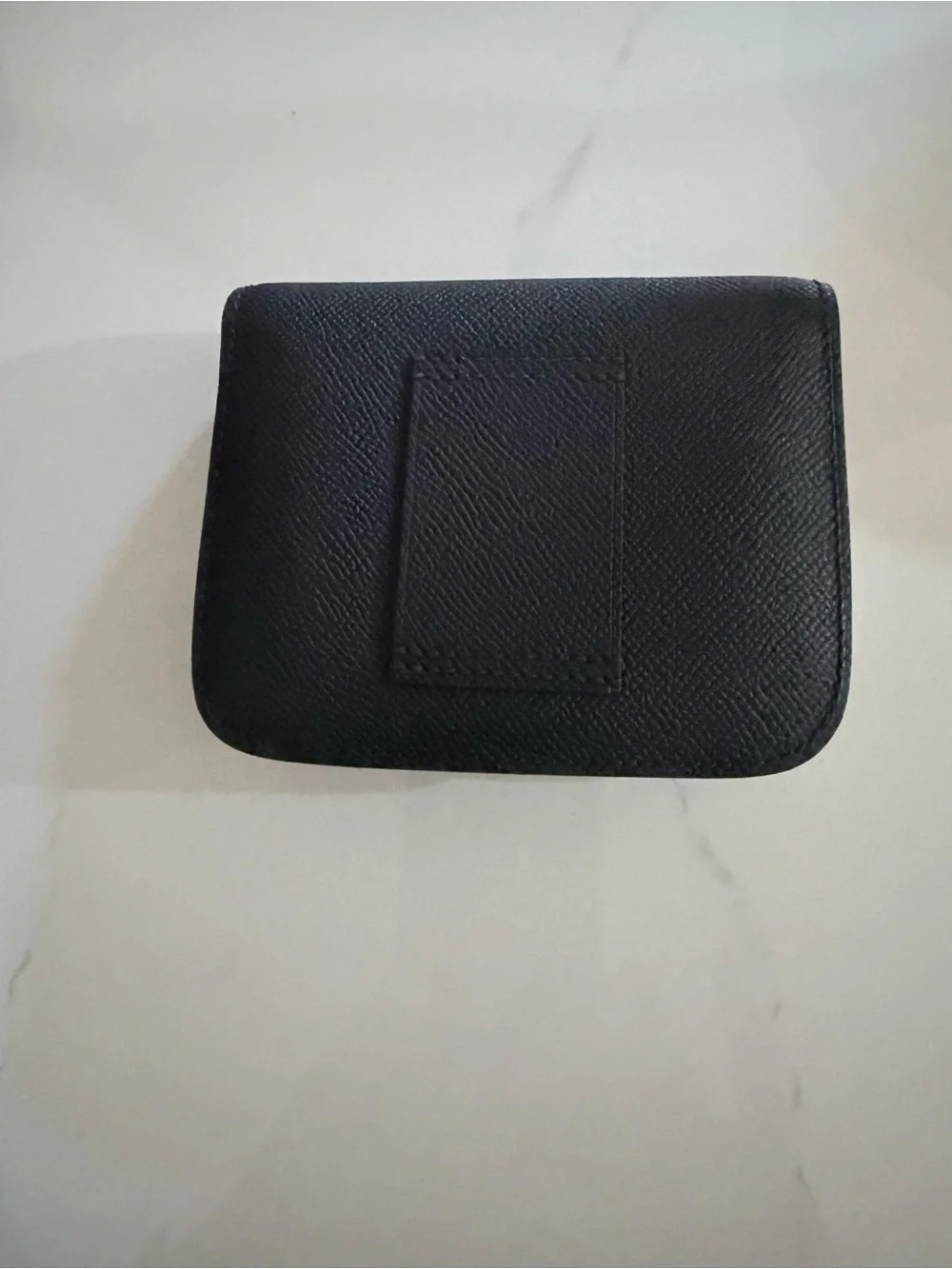 GRAY SLIM WALLET BELT WITH SILVER HARDWARE.